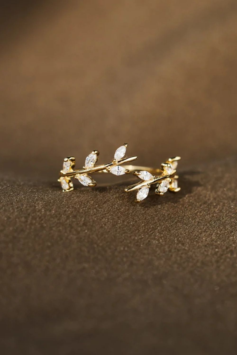 simple rings moissanite wedding band Adjustable Leaf Open Ring in 925 Sterling Silver – Donjane in Gold, size 7, shown in close-up highlighting gemstone detail