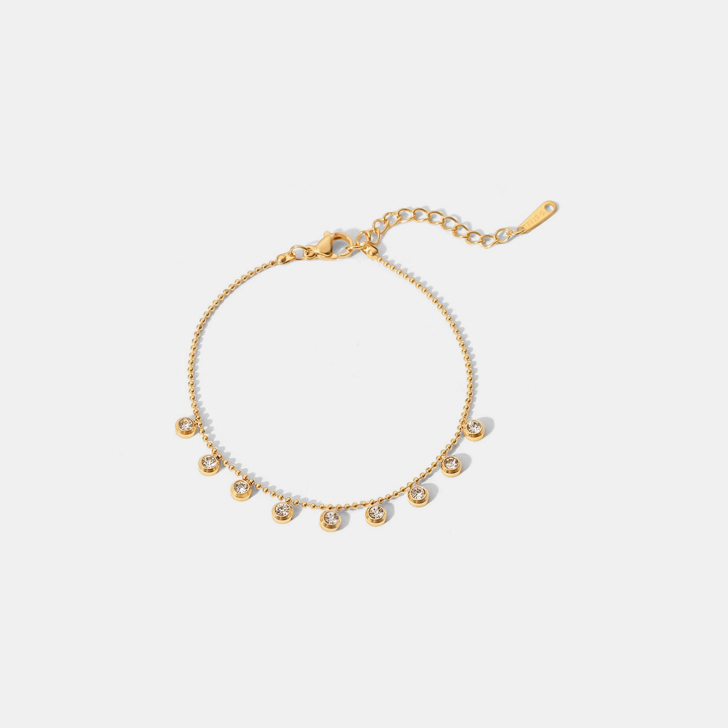zircon 18k gold-plated stainless steel bracelet shown as activewear
