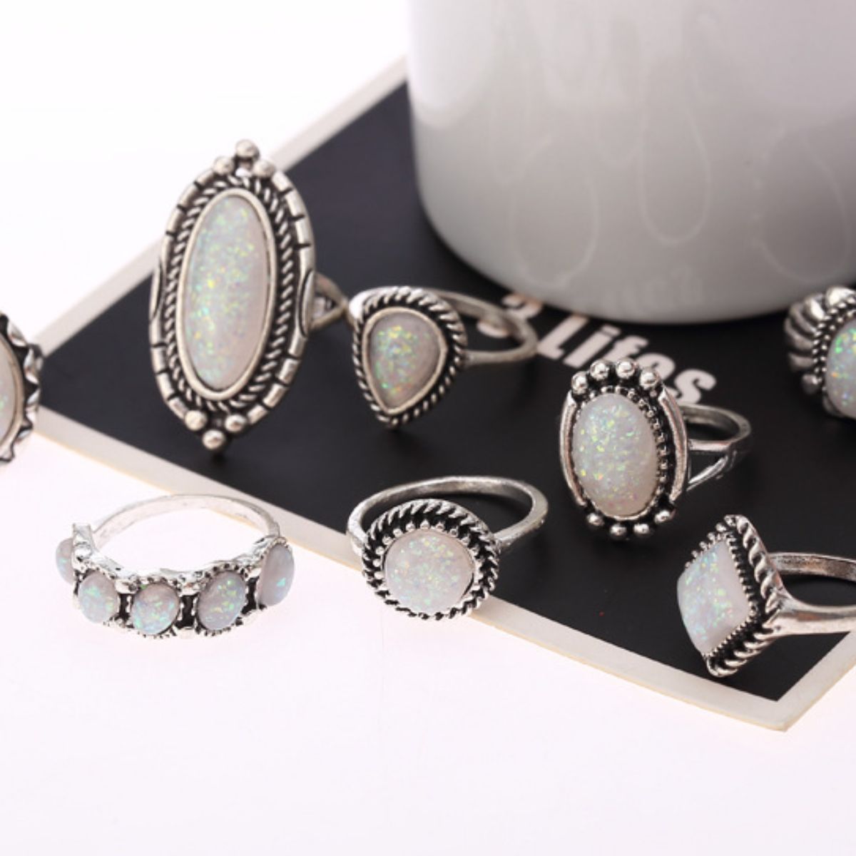 Donjane 8-piece boho ring set featuring opal stones and bold shapes