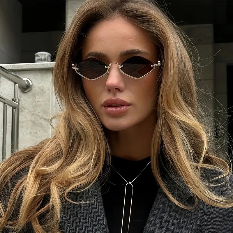 cat eye sunglasses with gold metal frame shown as apparel