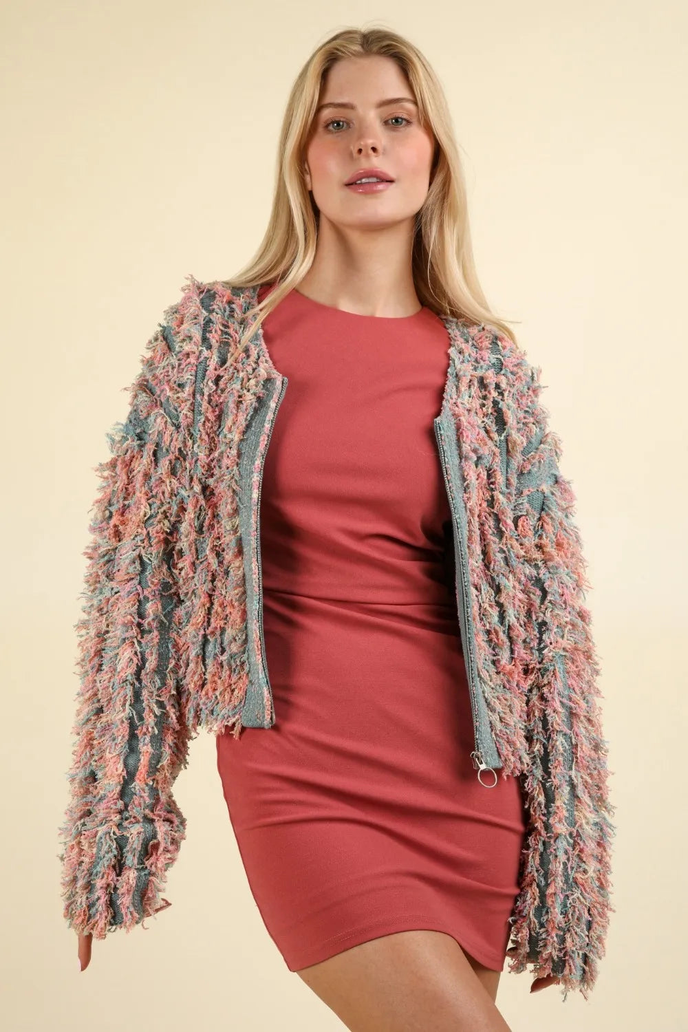 snap-front winter jacket for women in mountain lodge setting