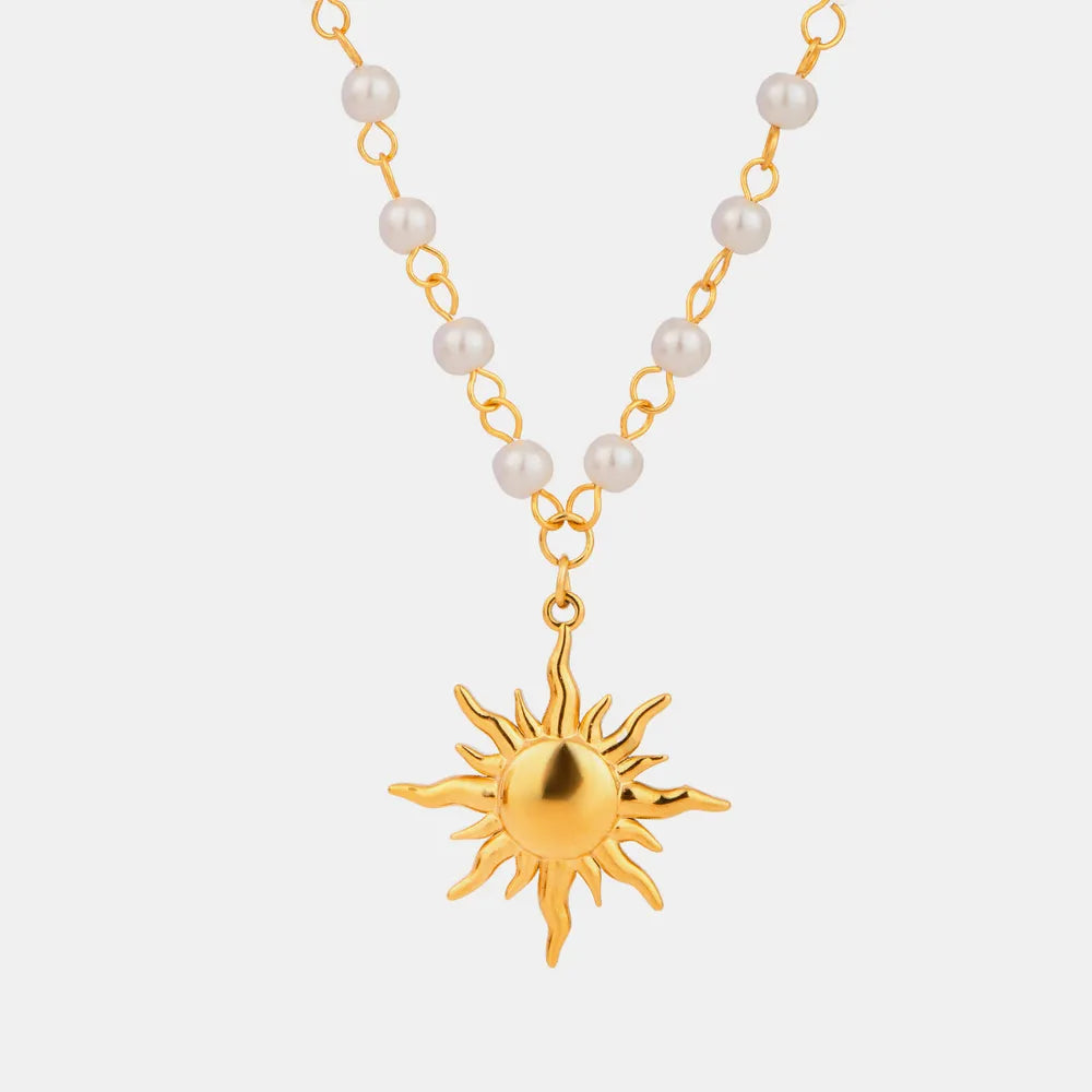 women’s apparel — 18k gold-plated pearl sun necklace