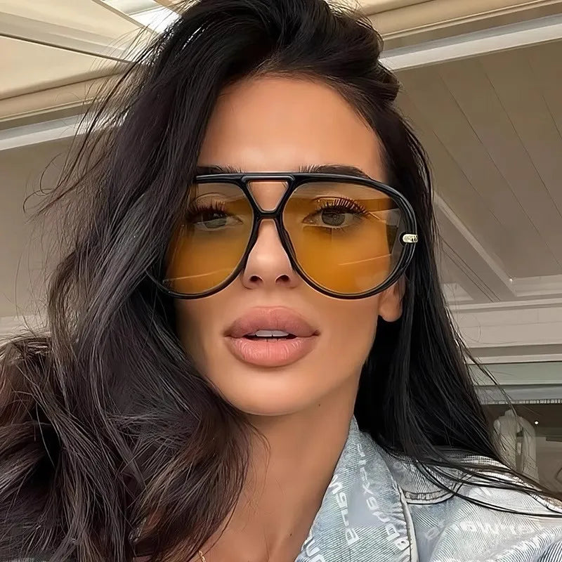 aviator fashion sunglasses with yellow tinted lenses styled as apparel