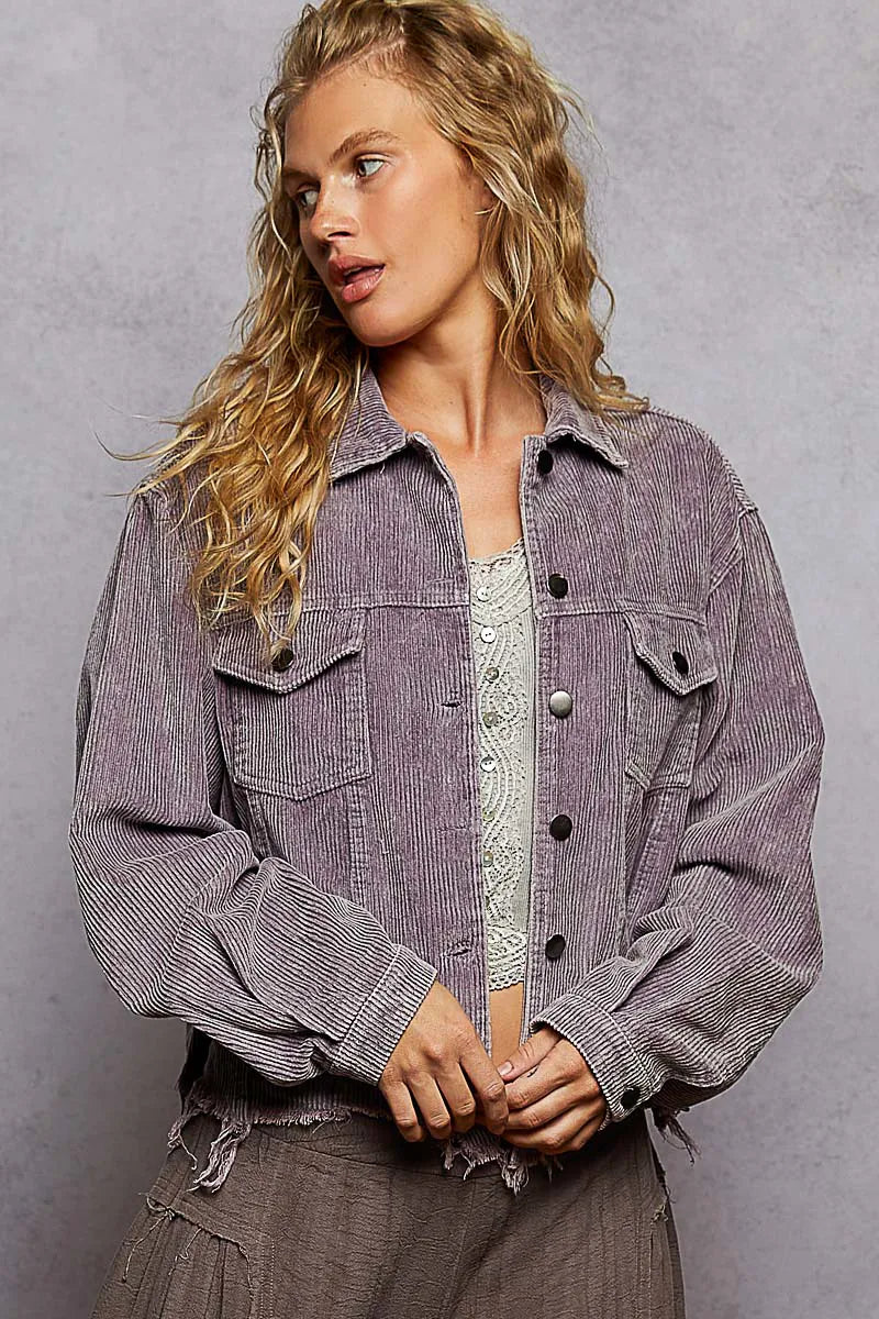 hooded outerwear jacket in city snow