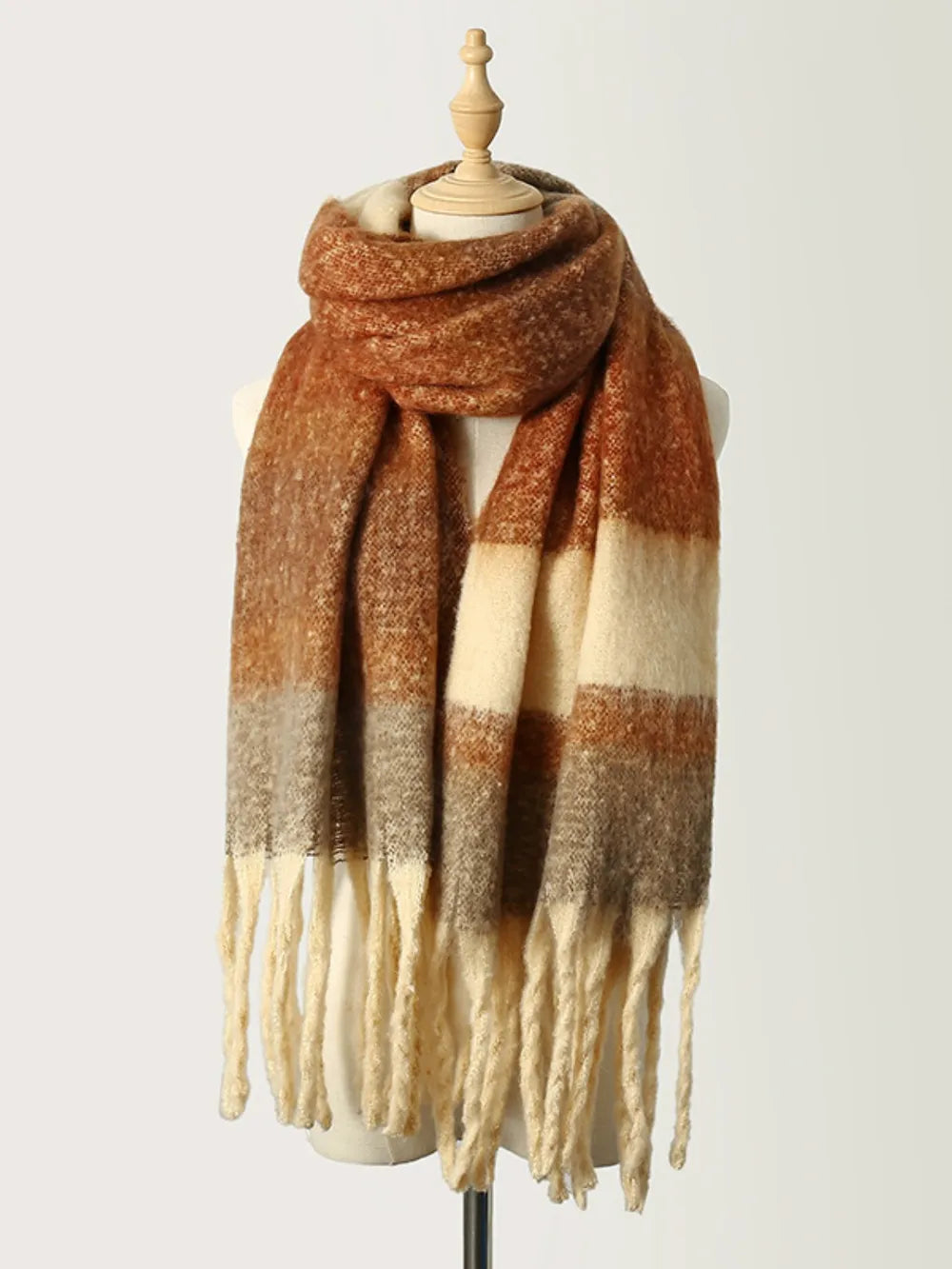 cashmere blend scarf layered over coat