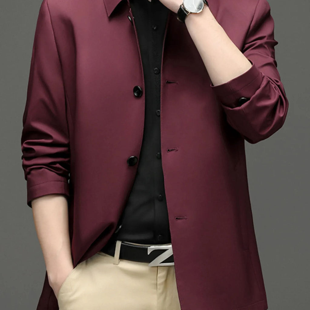 Man wearing sleek red longred coat for cold autumn days