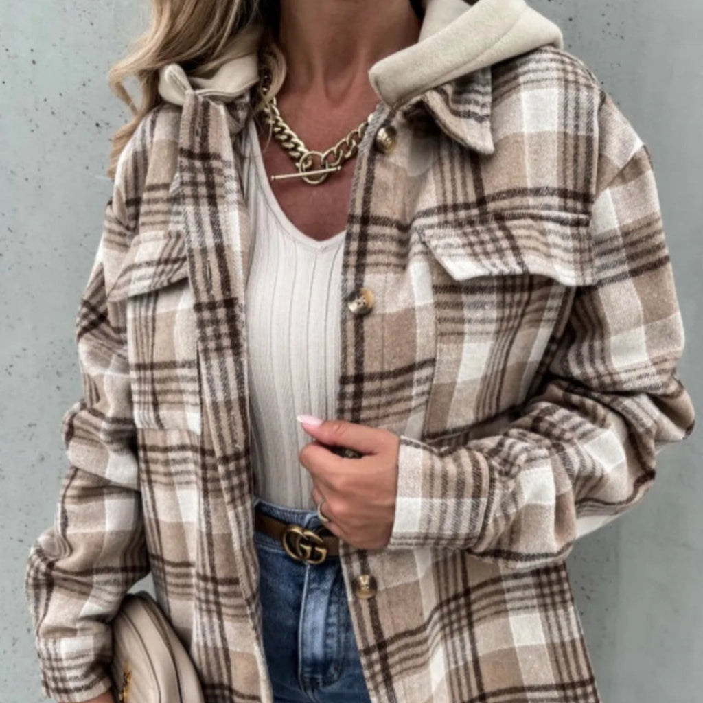 woman wearing plaid button-up winter jacket with hoodie and gold chain necklace