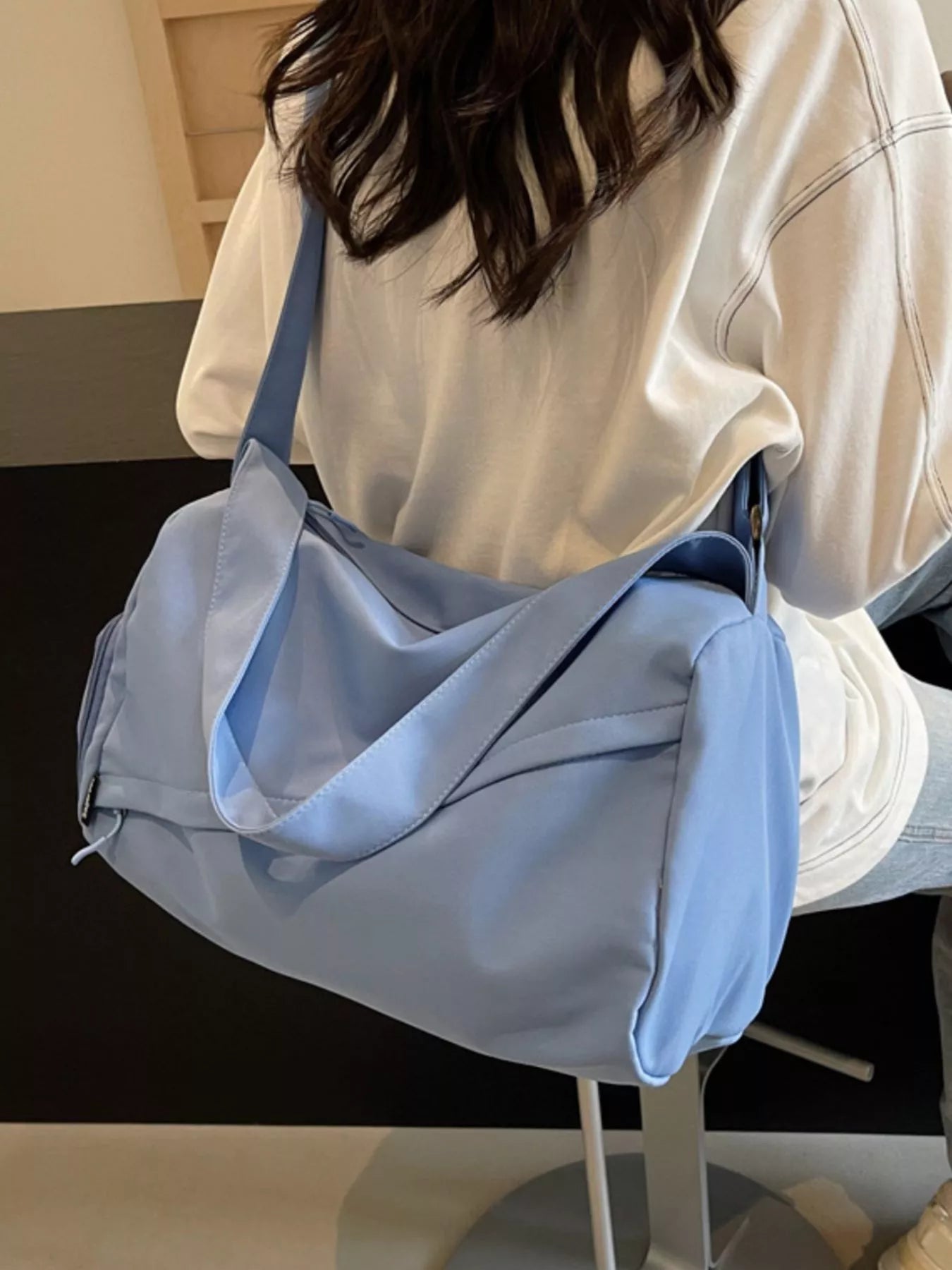 women's lightweight travel duffel bag with shoulder strap - back view