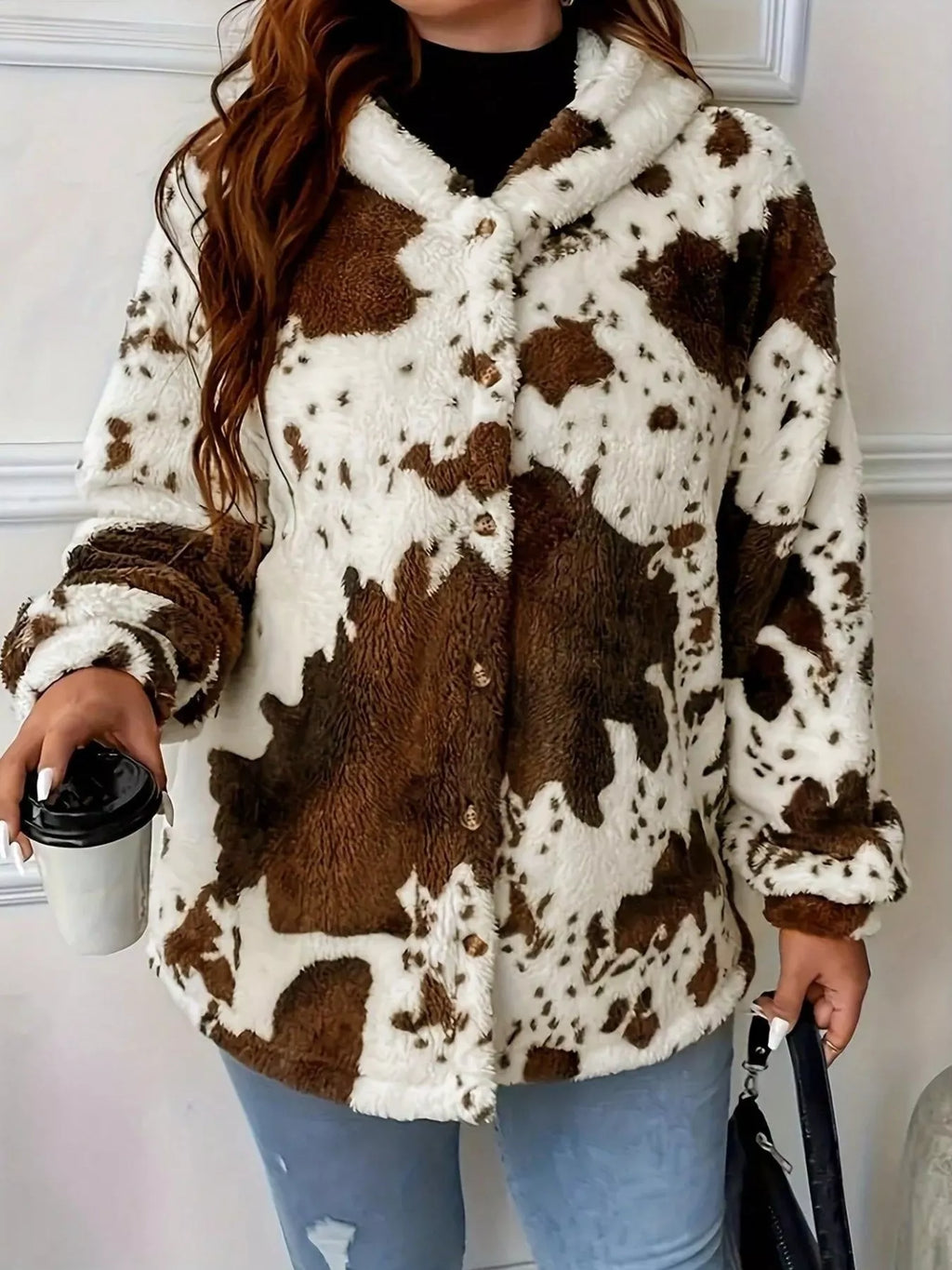 women's cow print plush hooded outerwear - close-up detail