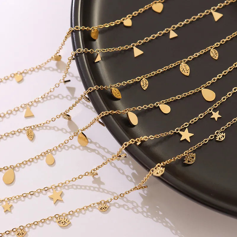 titanium steel charm necklace — women’s activewear view