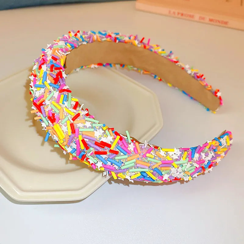 woman wearing vibrant multicolor headband with modern style

