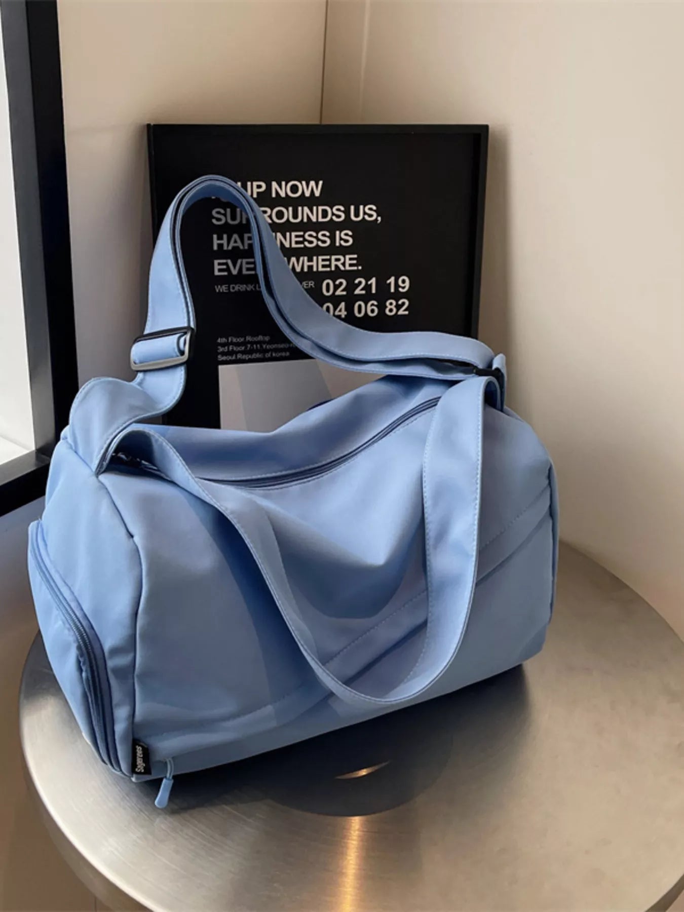 women's adjustable strap solid color travel bag - side view