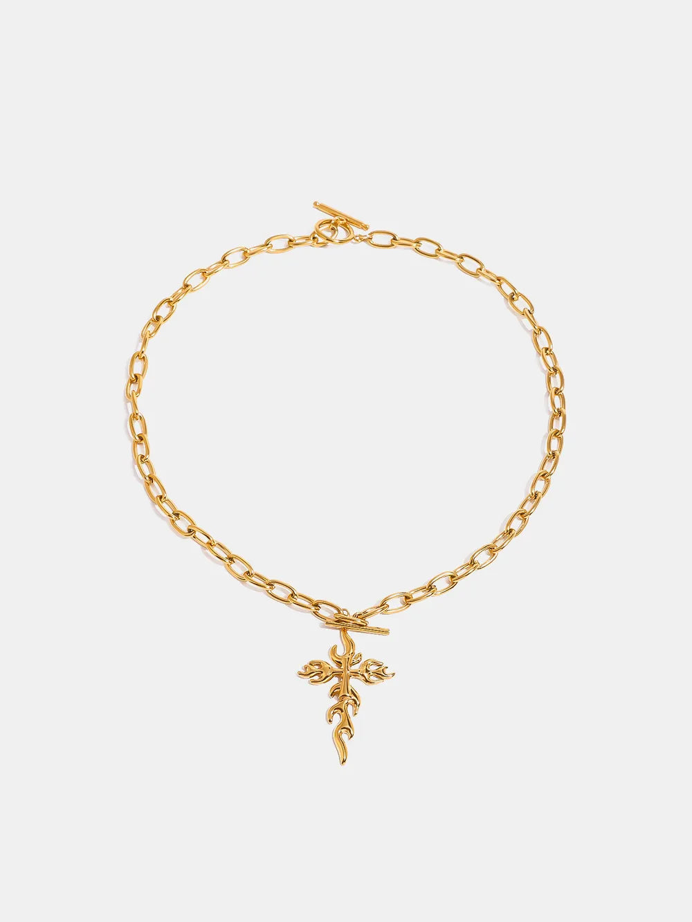 18k gold-plated stainless steel cross necklace shown as women’s activewear