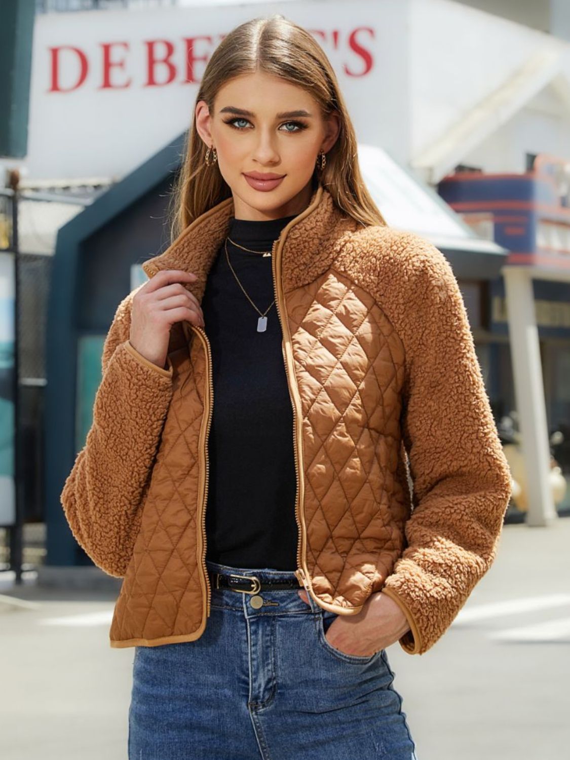faux shearling winter jacket for women in mountain lodge setting