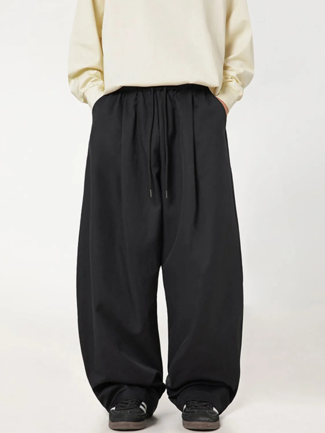 men's side ruched wide leg pants styled as a men’s apparel