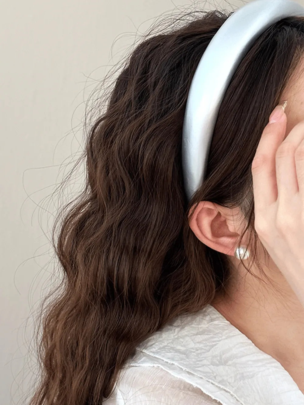 pink PU headband worn in soft wave hairstyle from the side

