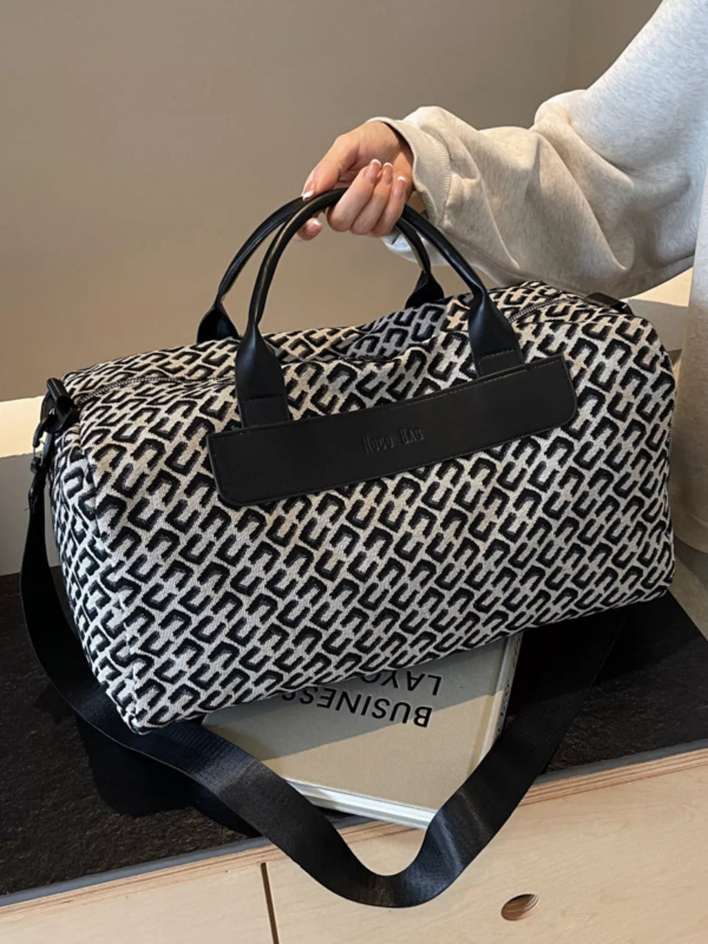 women's geometric pattern travel bag - styled view