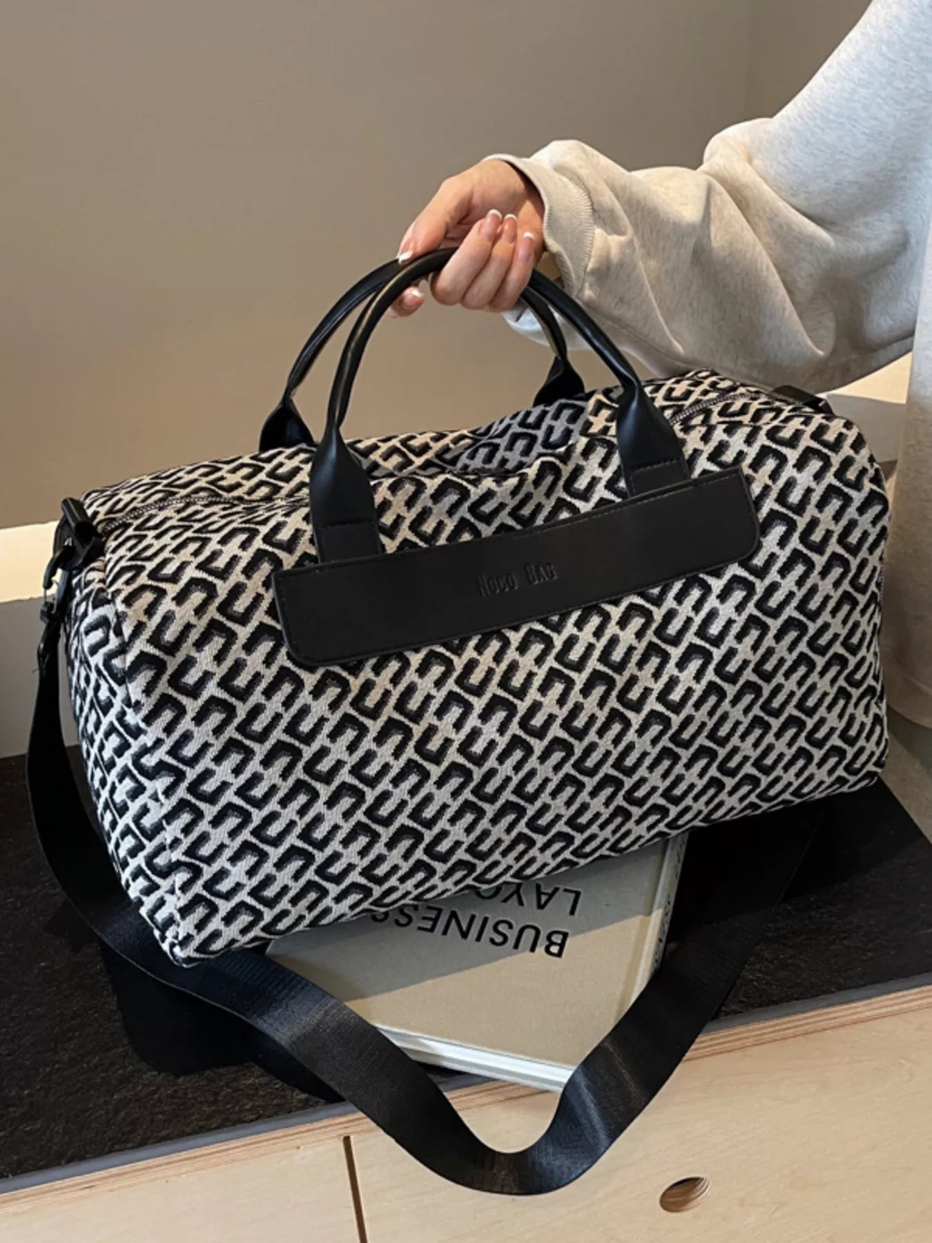 women's geometric pattern travel bag - styled view