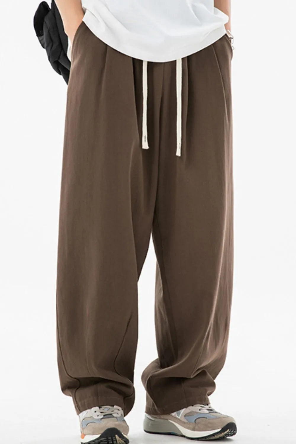 men's drawstring sweatpants with pockets shown as men’s apparel