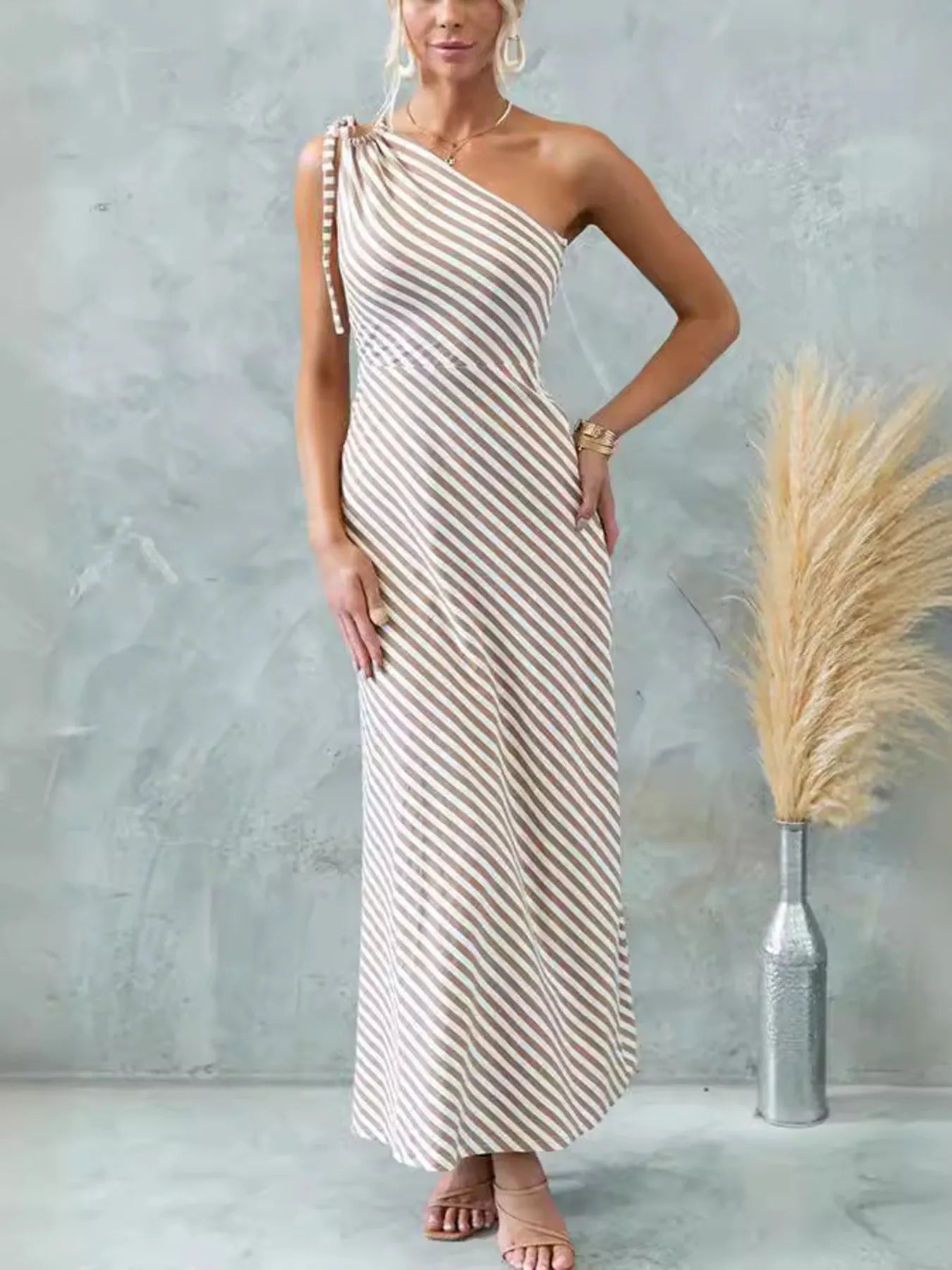 one shoulder striped maxi dress shown as women’s dress