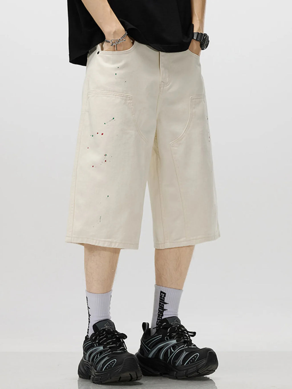 men's men's loose-fit splatter-paint denim capris - close-up detail