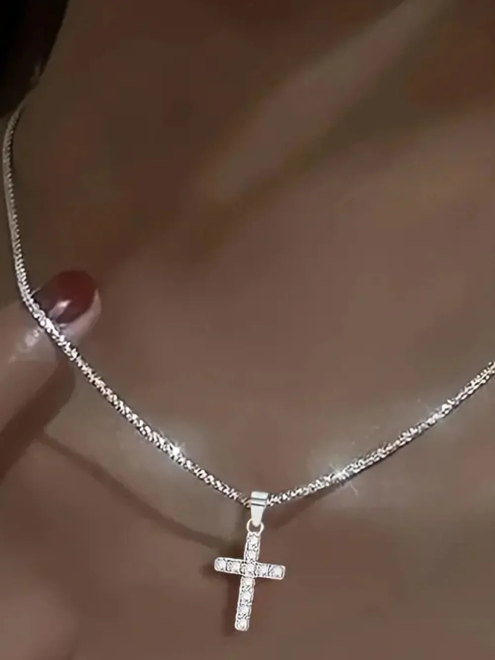 925 sterling silver cross necklace styled as a women’s apparel