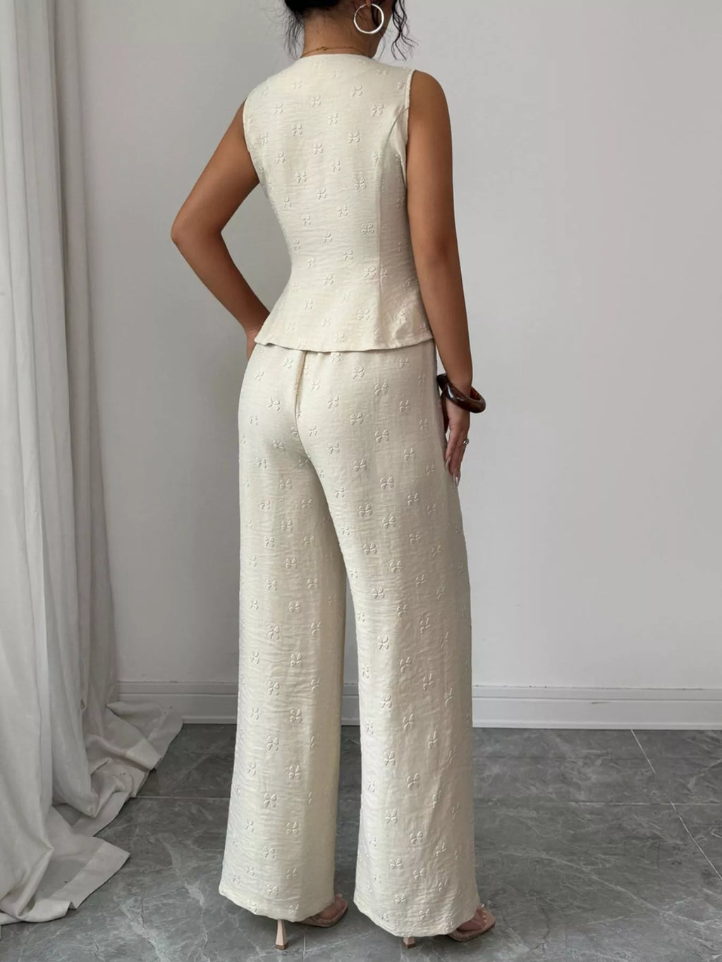 women's sleeveless peplum top and wide leg pants set - styling option