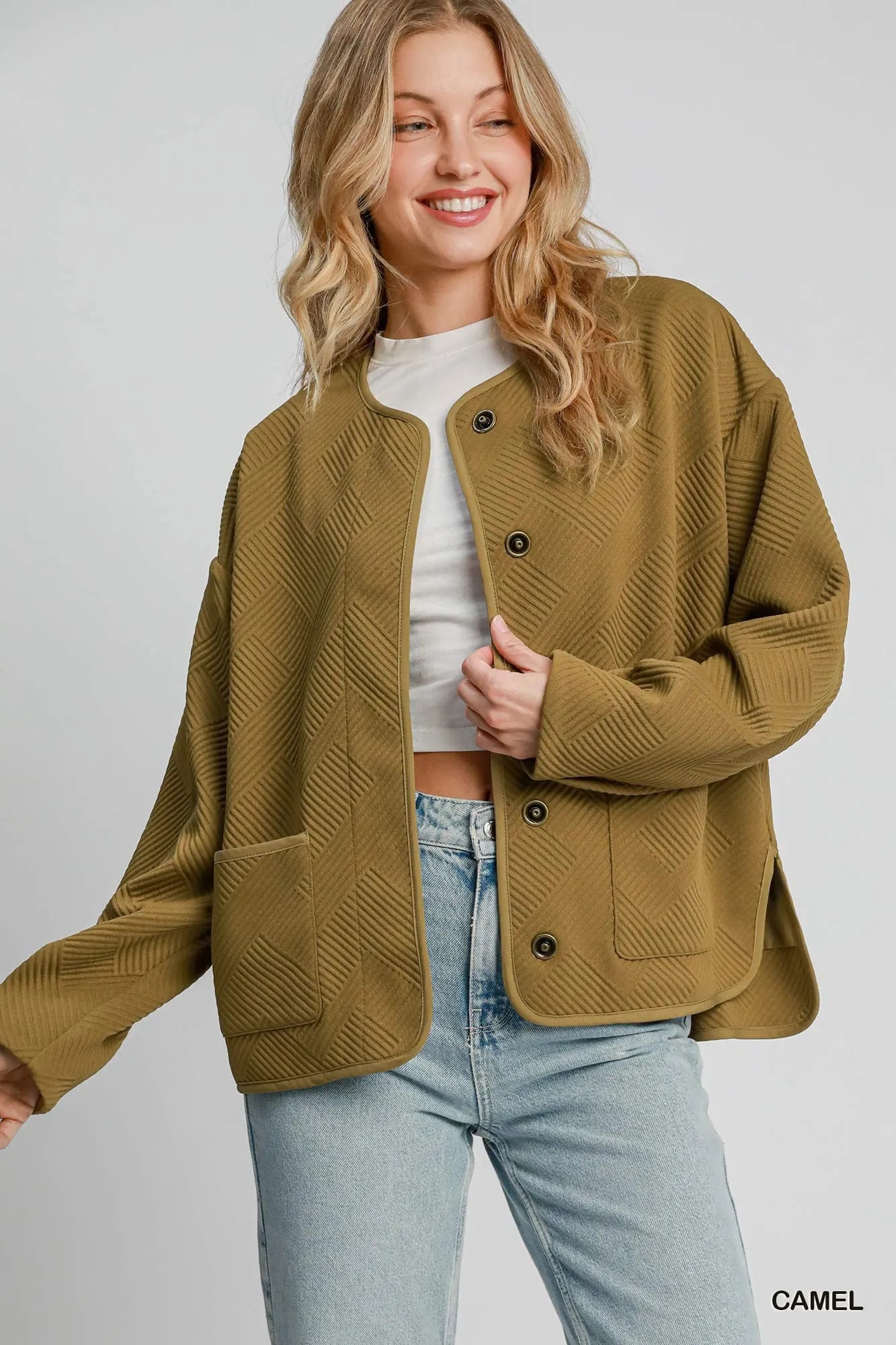 wool-blend outerwear jacket paired with scarf