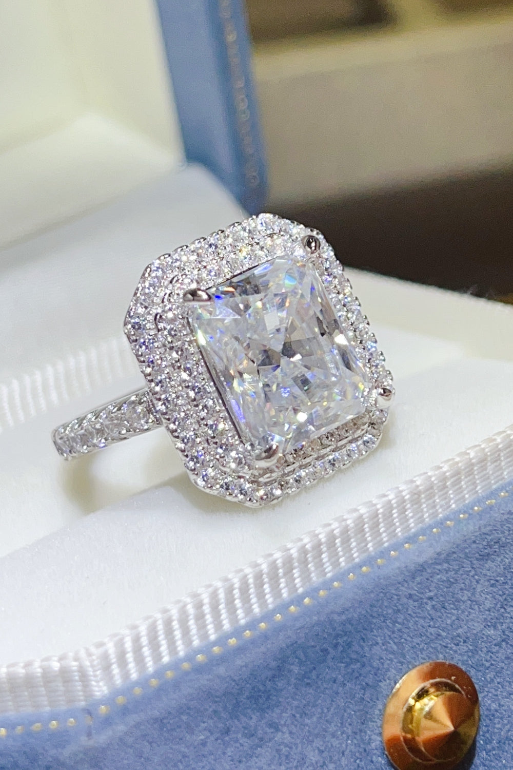 women's gold and silver ring cushion cut moissanite 2 Carat Moissanite 925 Sterling Silver Ring in Silver, size 9, 5, 6, 7, 8, shown in side perspective highlighting gemstone detail