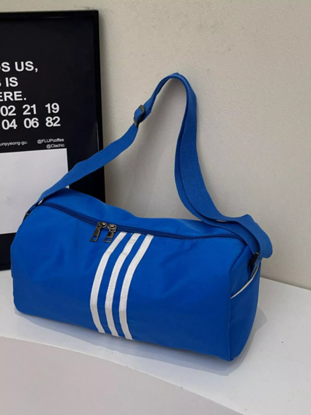 women's striped adjustable strap duffel bag - styling option