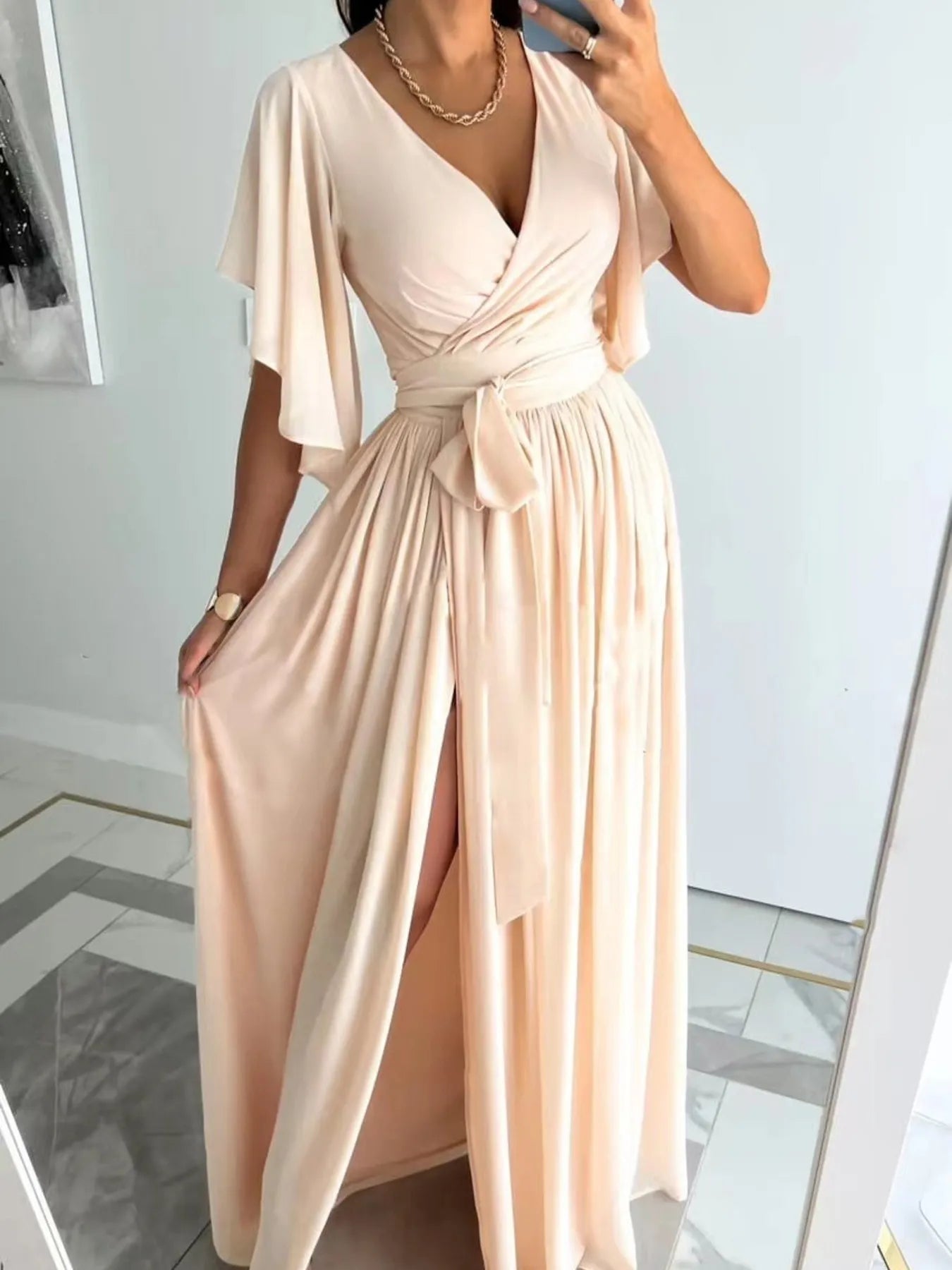 flutter sleeve surplice tie waist dress shown as women’s dress