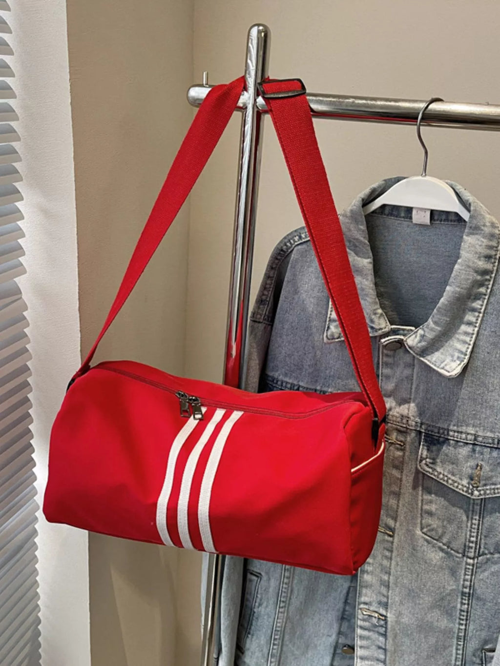 women's striped adjustable strap duffel bag - lifestyle shot