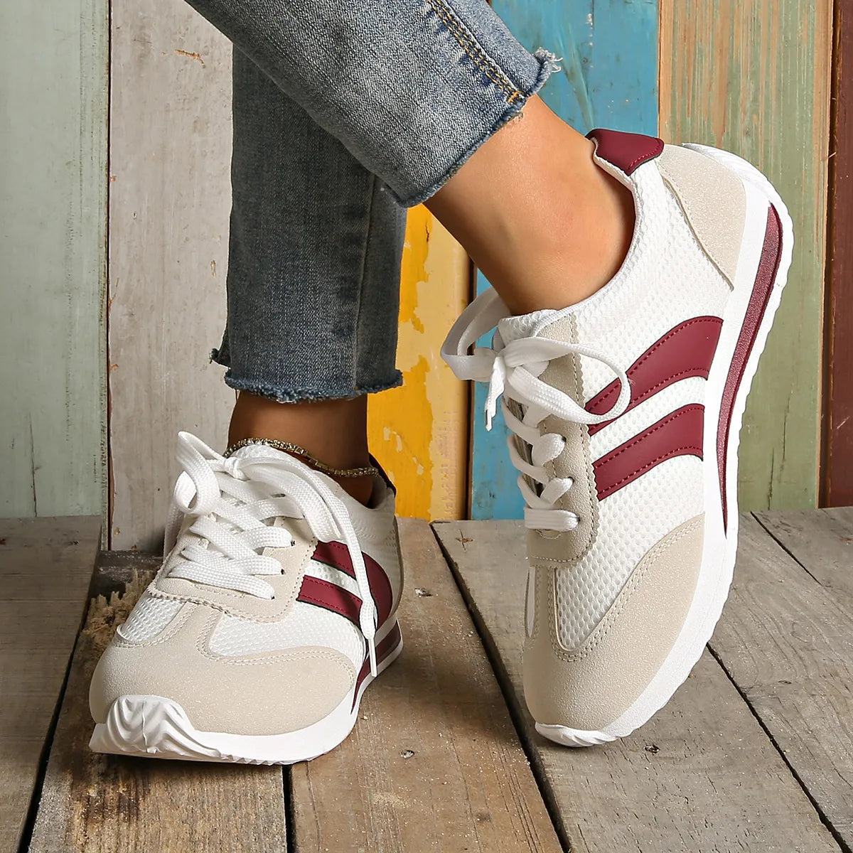women's striped contrast mesh lace up sneakers - styled view