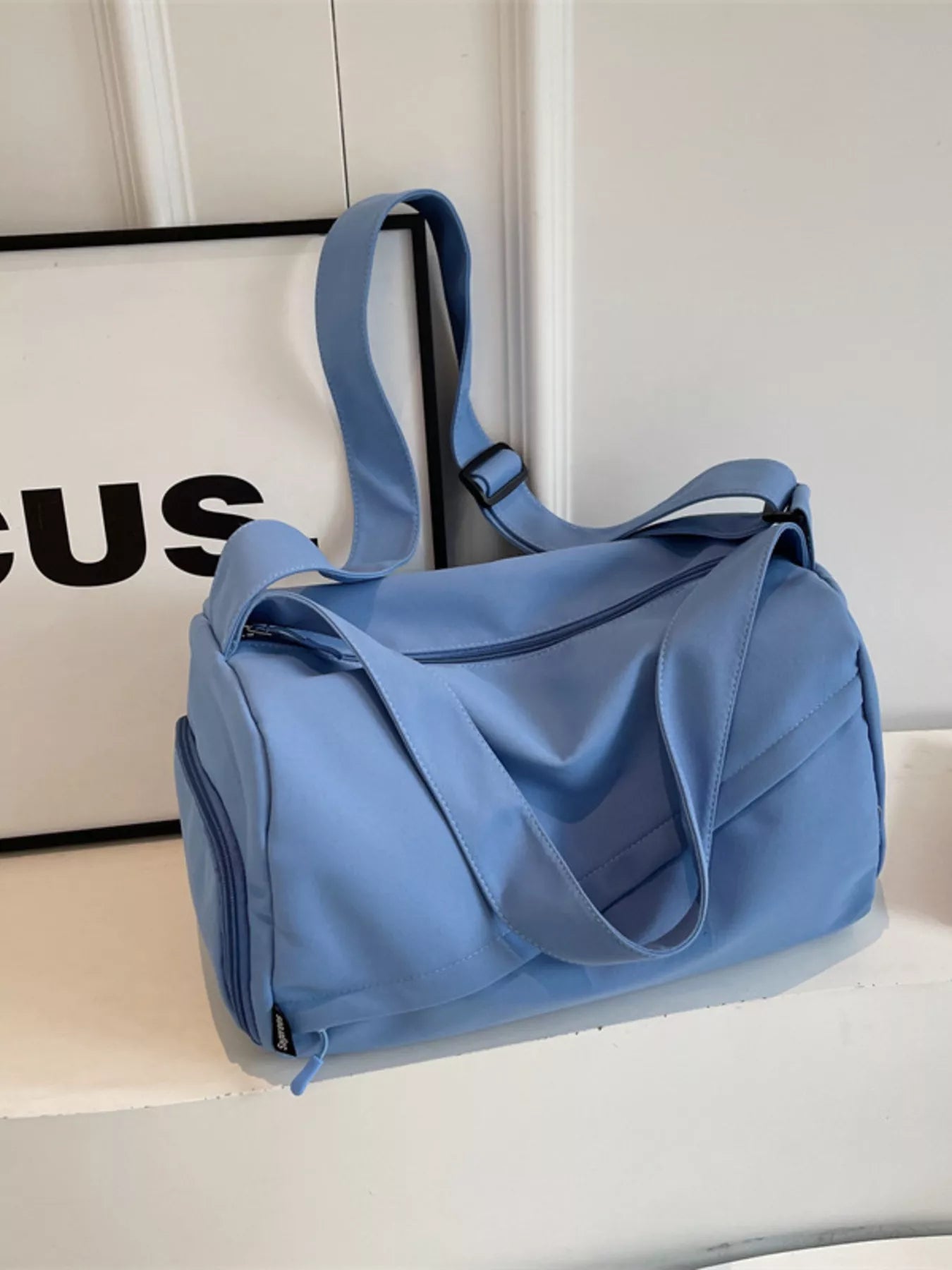 women's adjustable strap solid color travel bag - front view