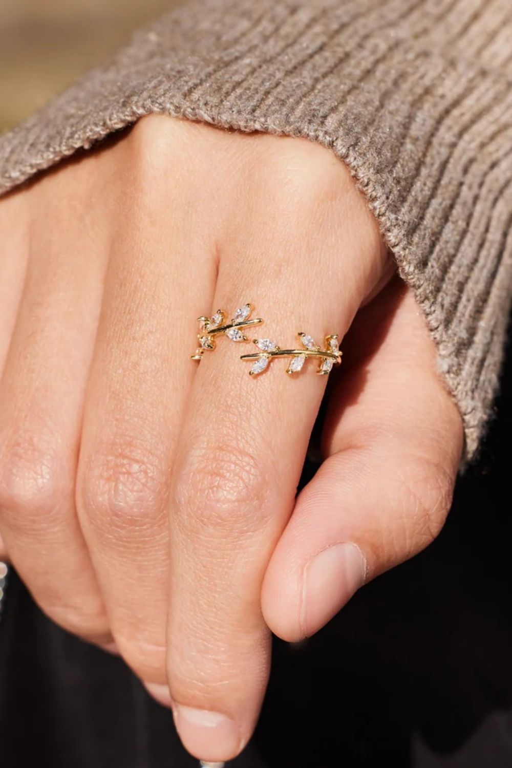Close-up of leaf ring design with open band – Donjane Jewelry