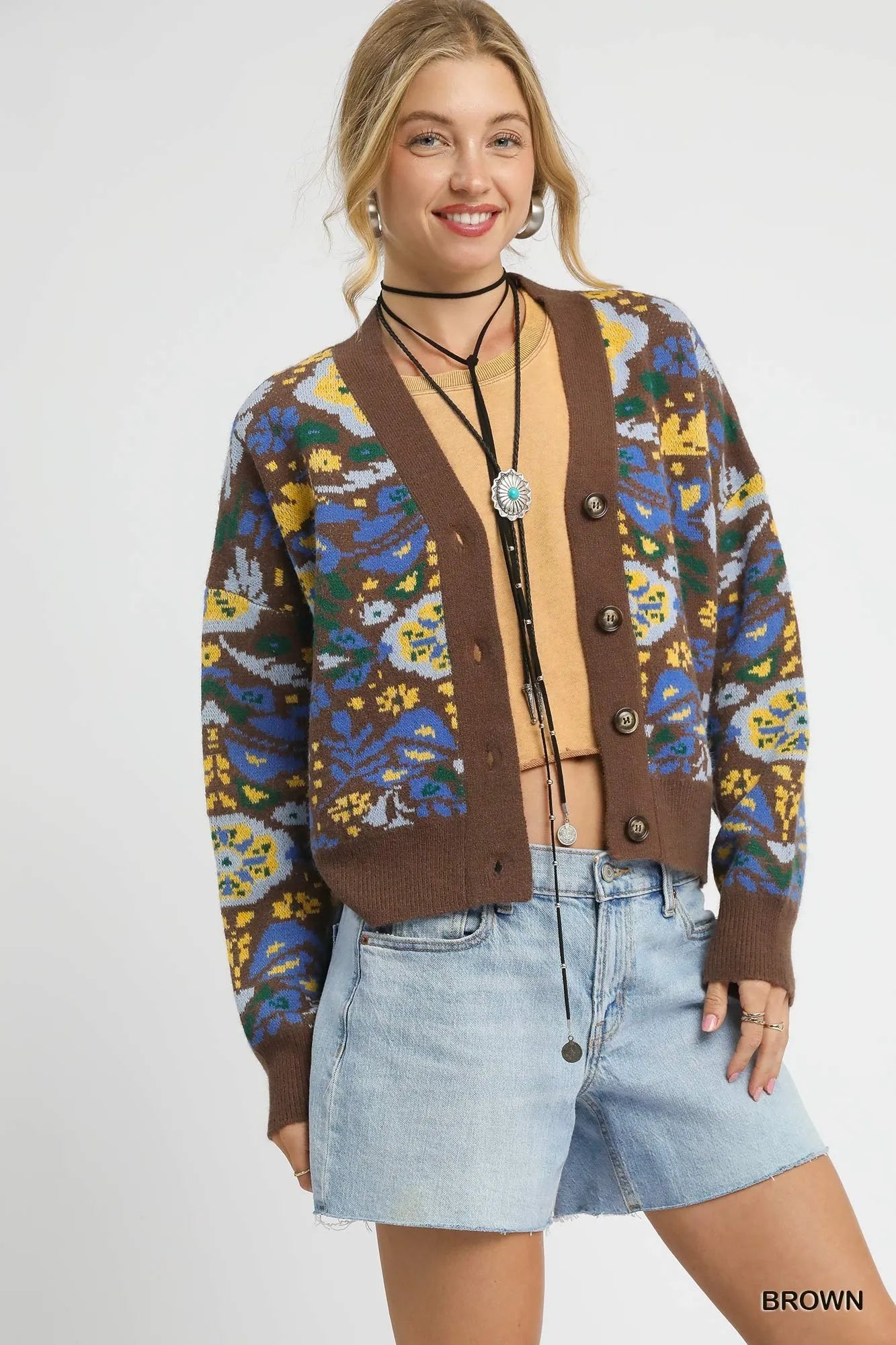 belted outerwear jacket in city snow
