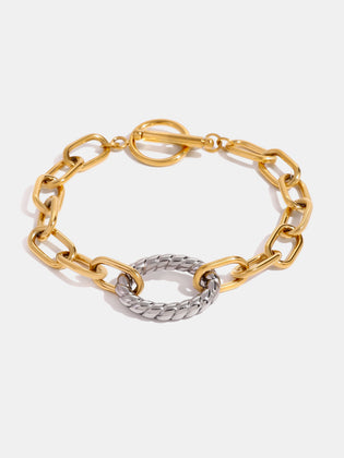 two-tone stainless steel chain bracelet shown as activewear