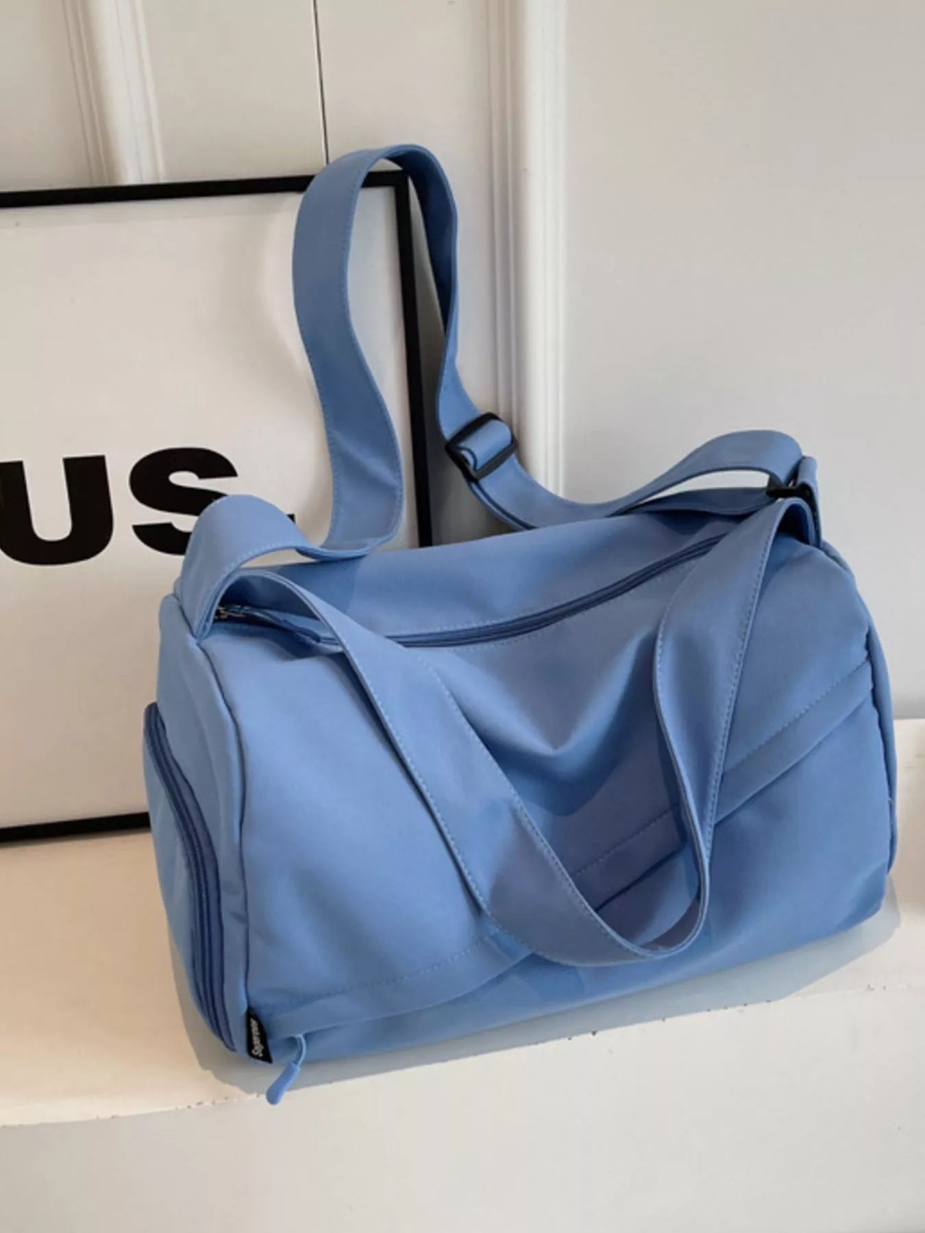 women's lightweight travel duffel bag with shoulder strap - styled view