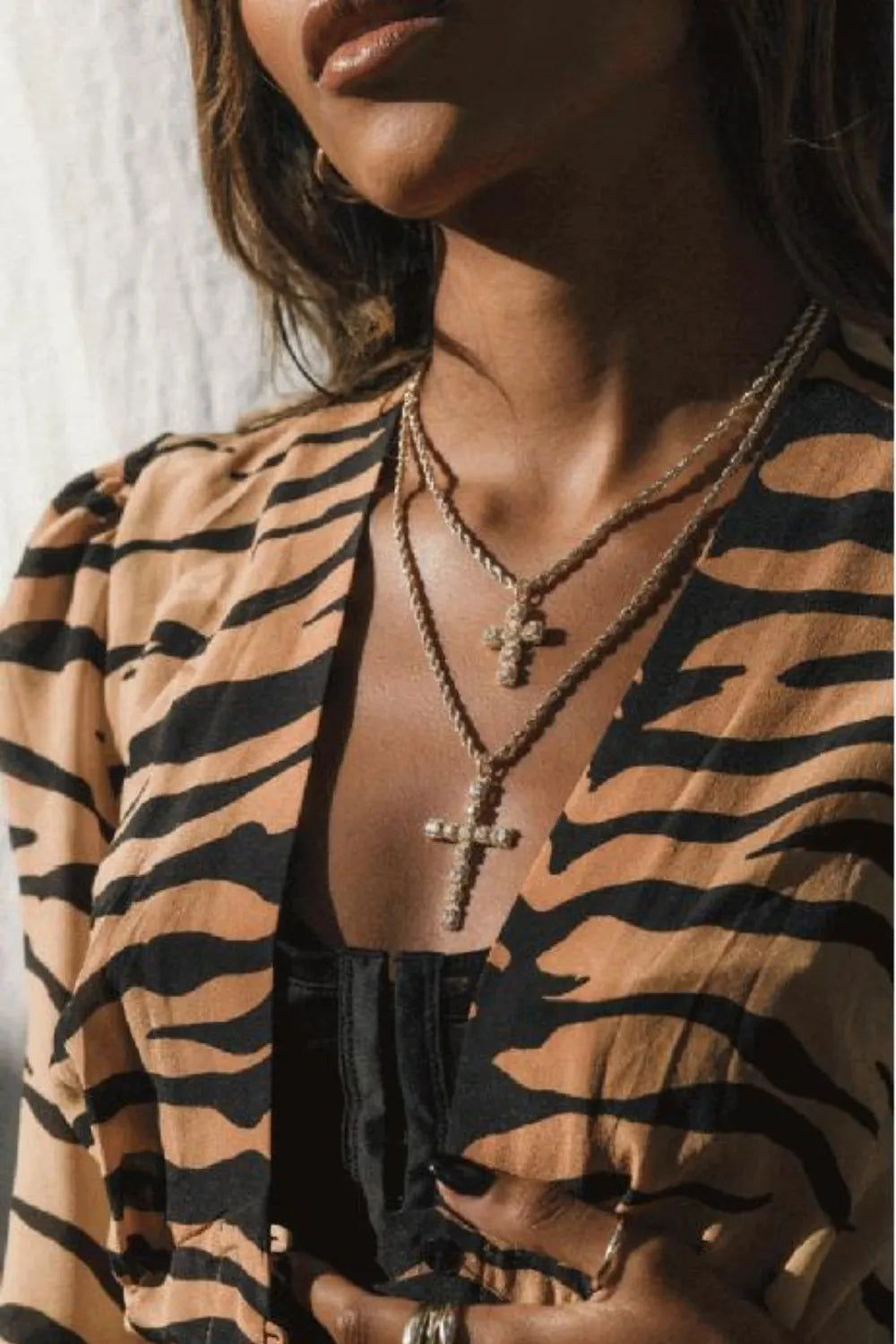 brass inlaid zircon cross pendant necklace shown as women’s apparel
