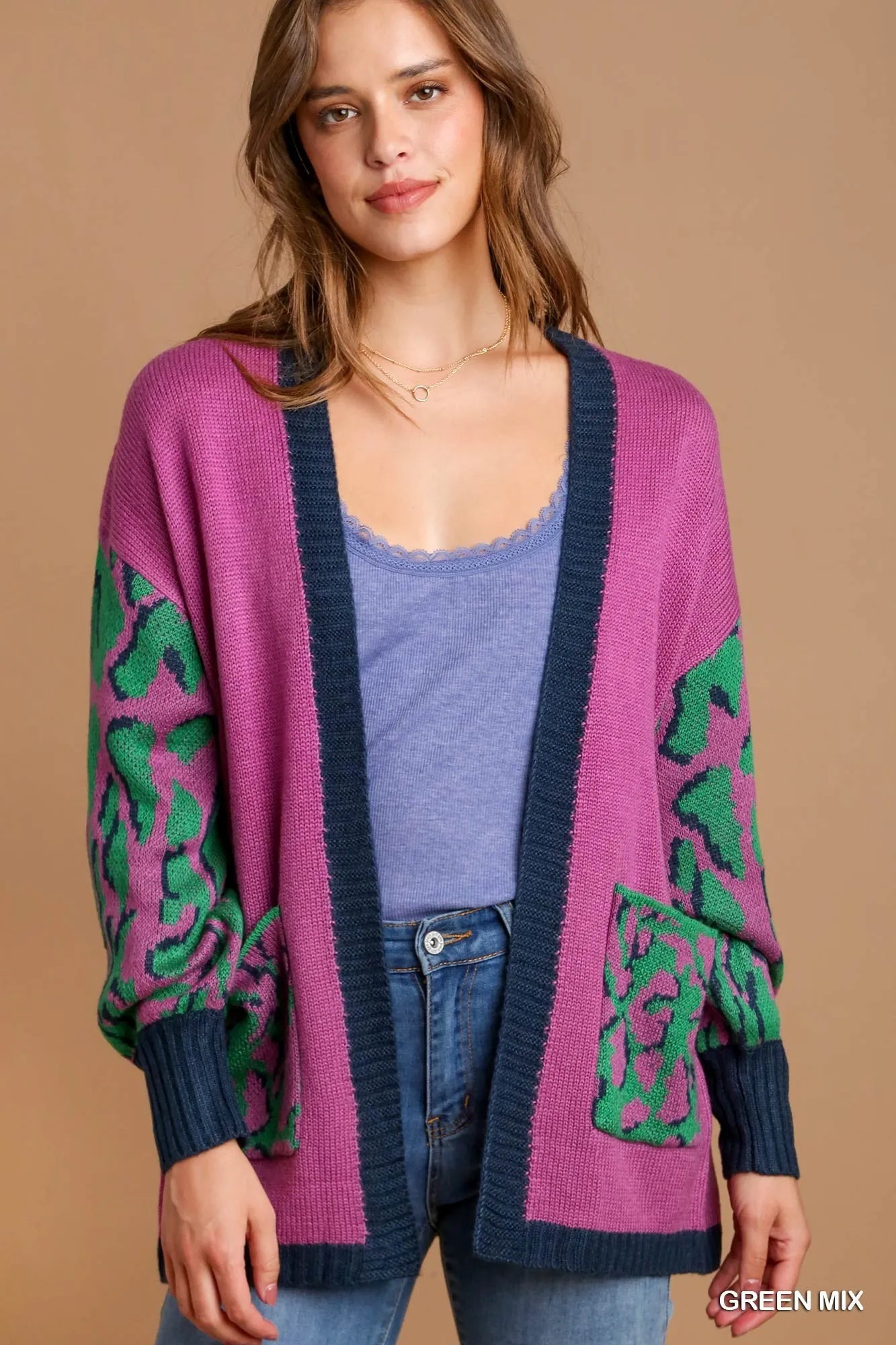 faux fur-trimmed outerwear jacket on a hanger