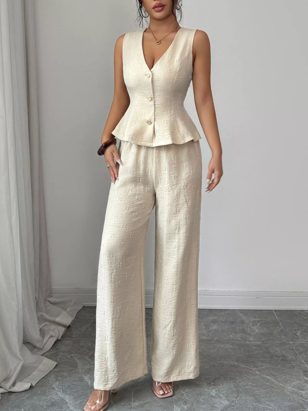 women's sleeveless peplum top and wide leg pants set - front view