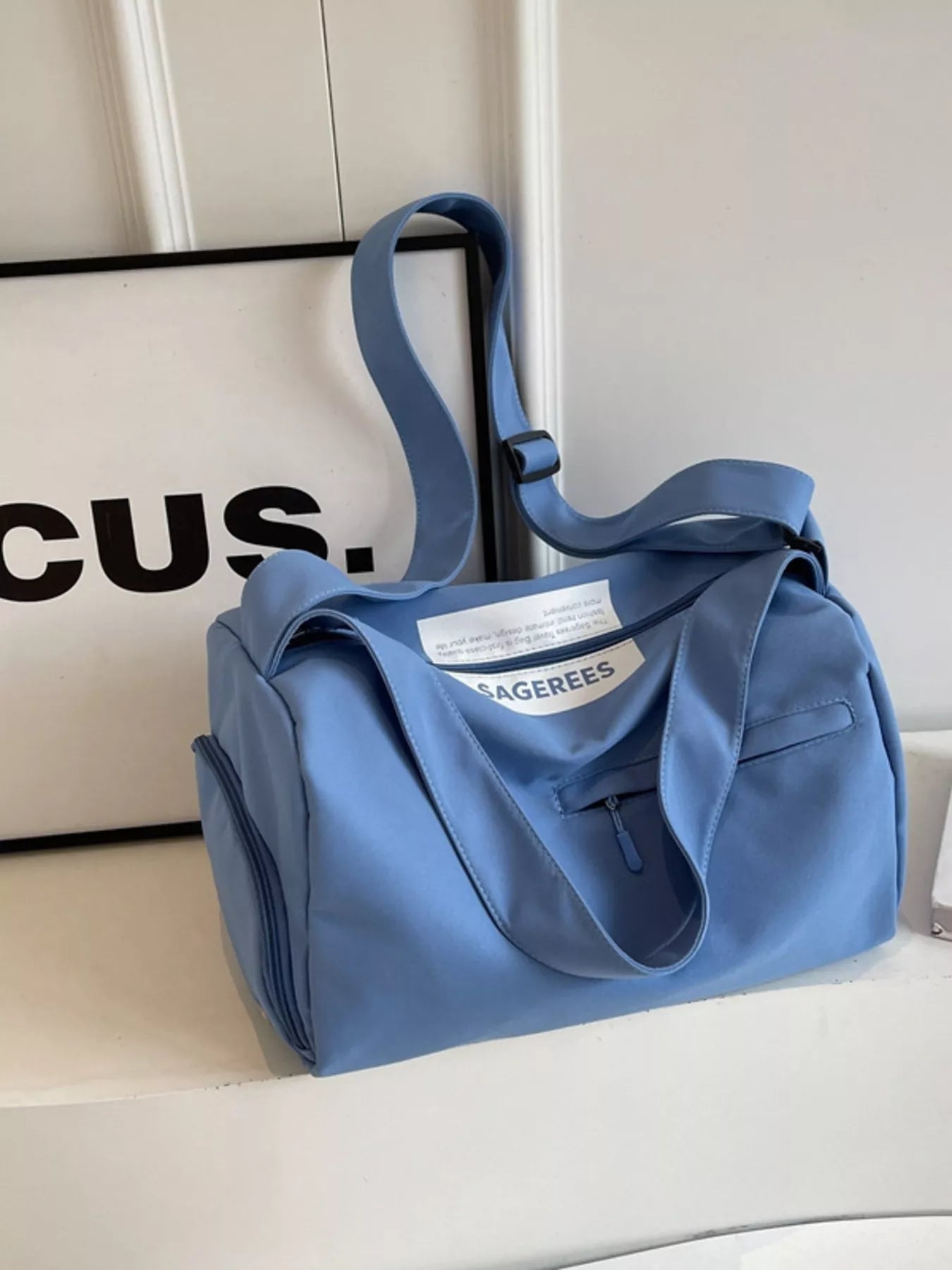 women's lightweight duffel travel bag with adjustable strap - close-up detail