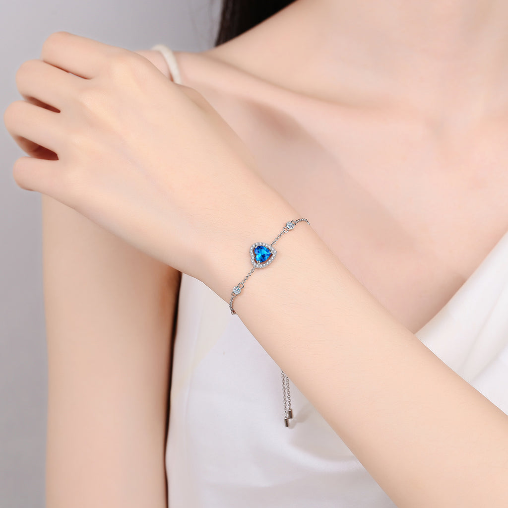 Luxury moissanite bracelet by Donjane shown in gift box with polished silver links

