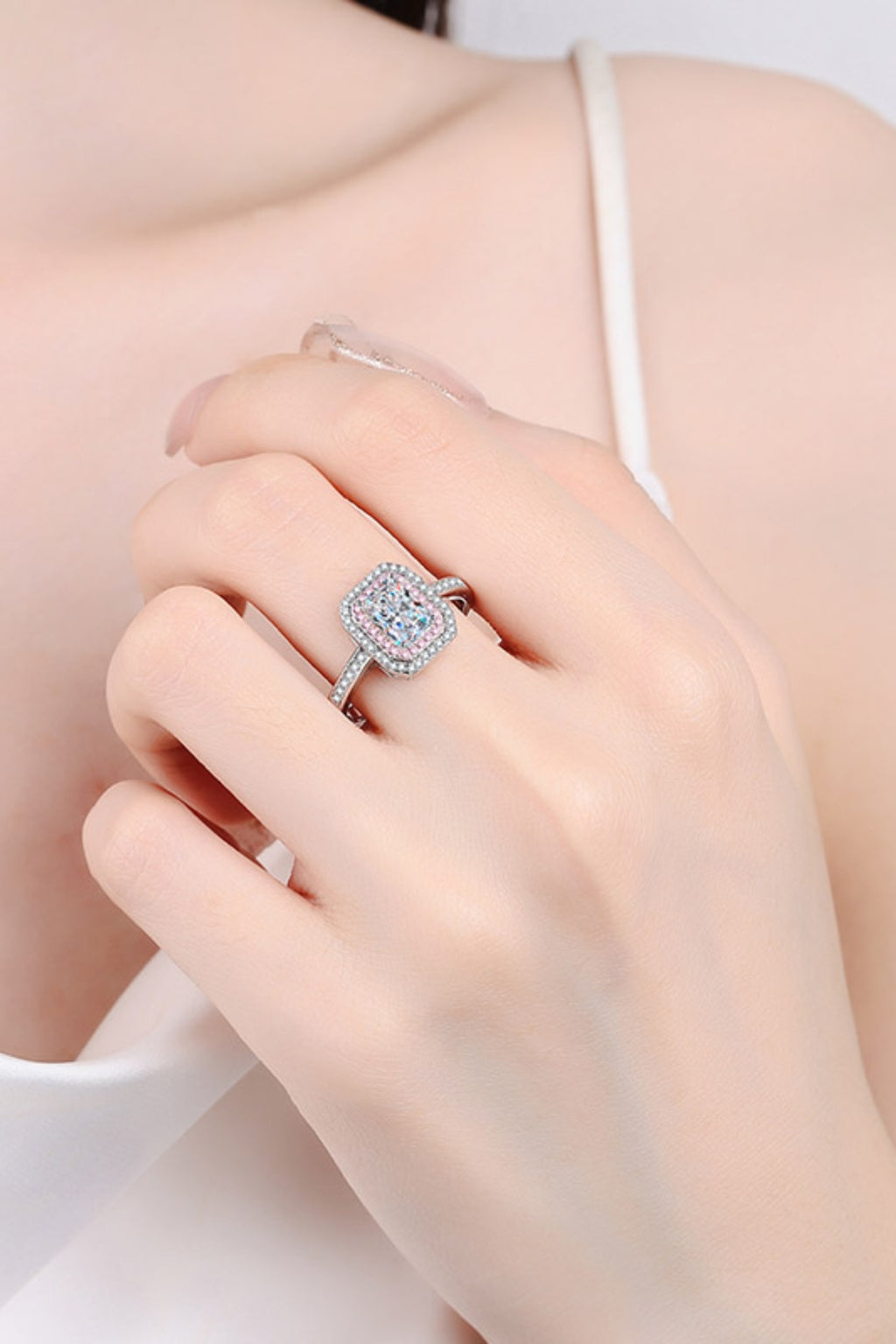 gold ring set halo setting ring 1 Carat Moissanite 925 Sterling Silver Ring in Silver, size 4, 5, 6, 7, 8, 9, shown in top view highlighting gemstone detail