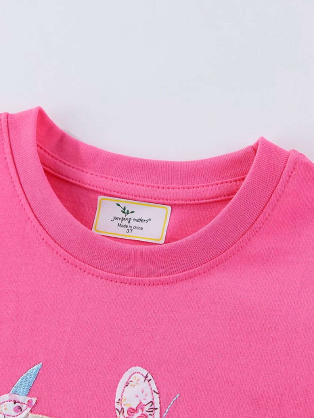 women's children's cute unicorn applique ruffle sleeve t-shirt - detail shot