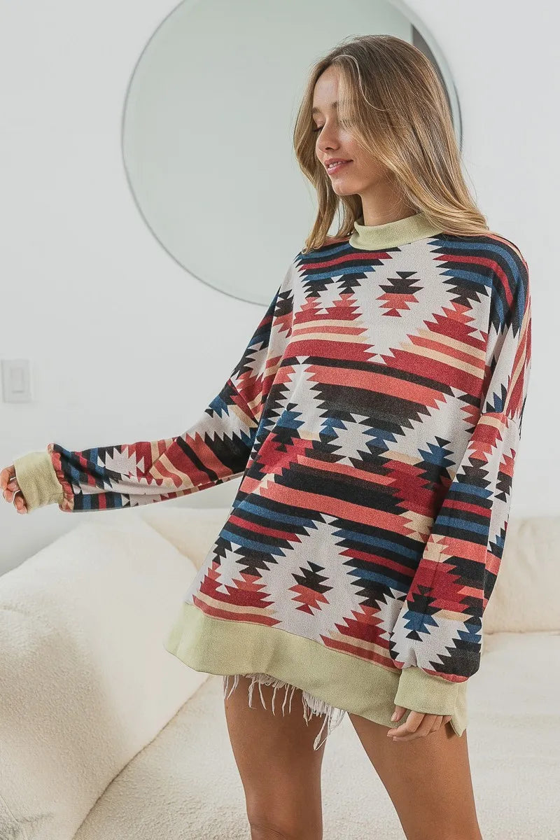 bibi aztec print mirr mock neck lslv top shown as women’s outerwear