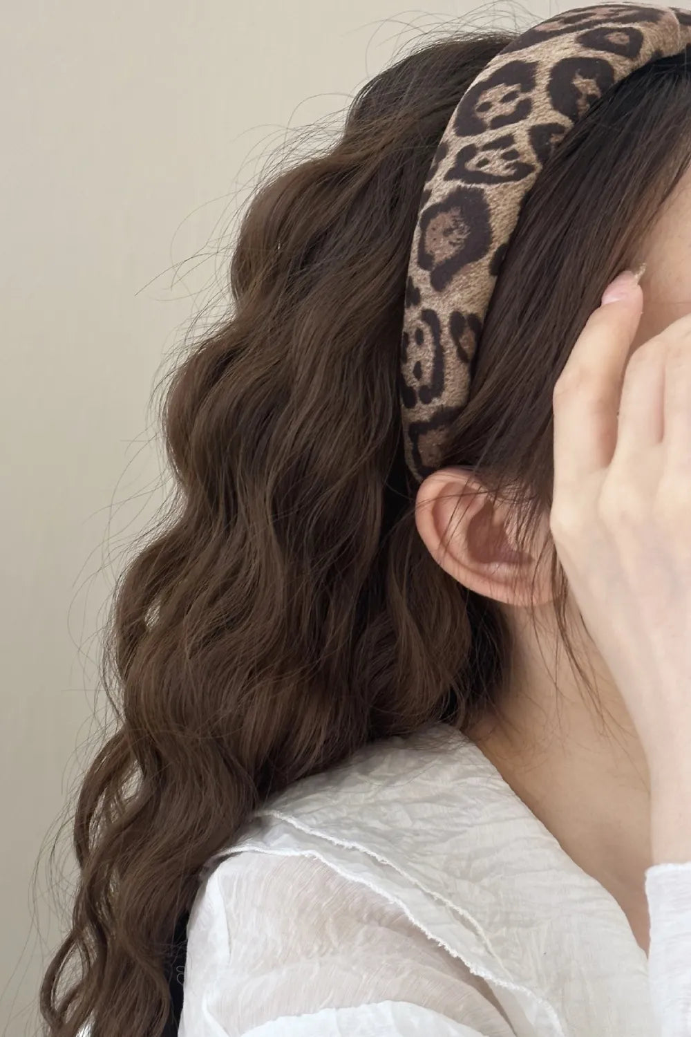 woman wearing leopard headband with soft waves