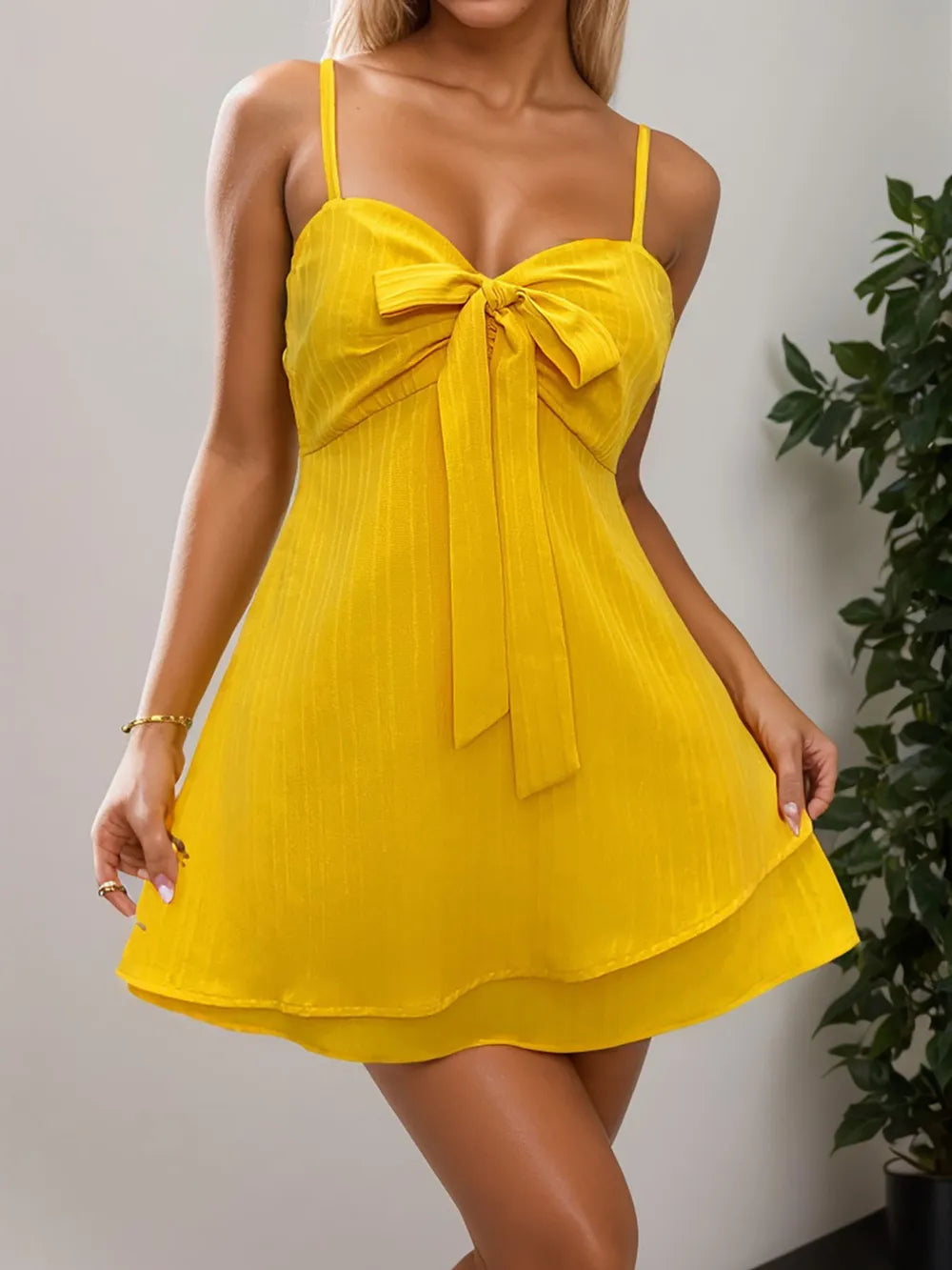 layered sweetheart neck bow front mini cami dress shown as women’s dress