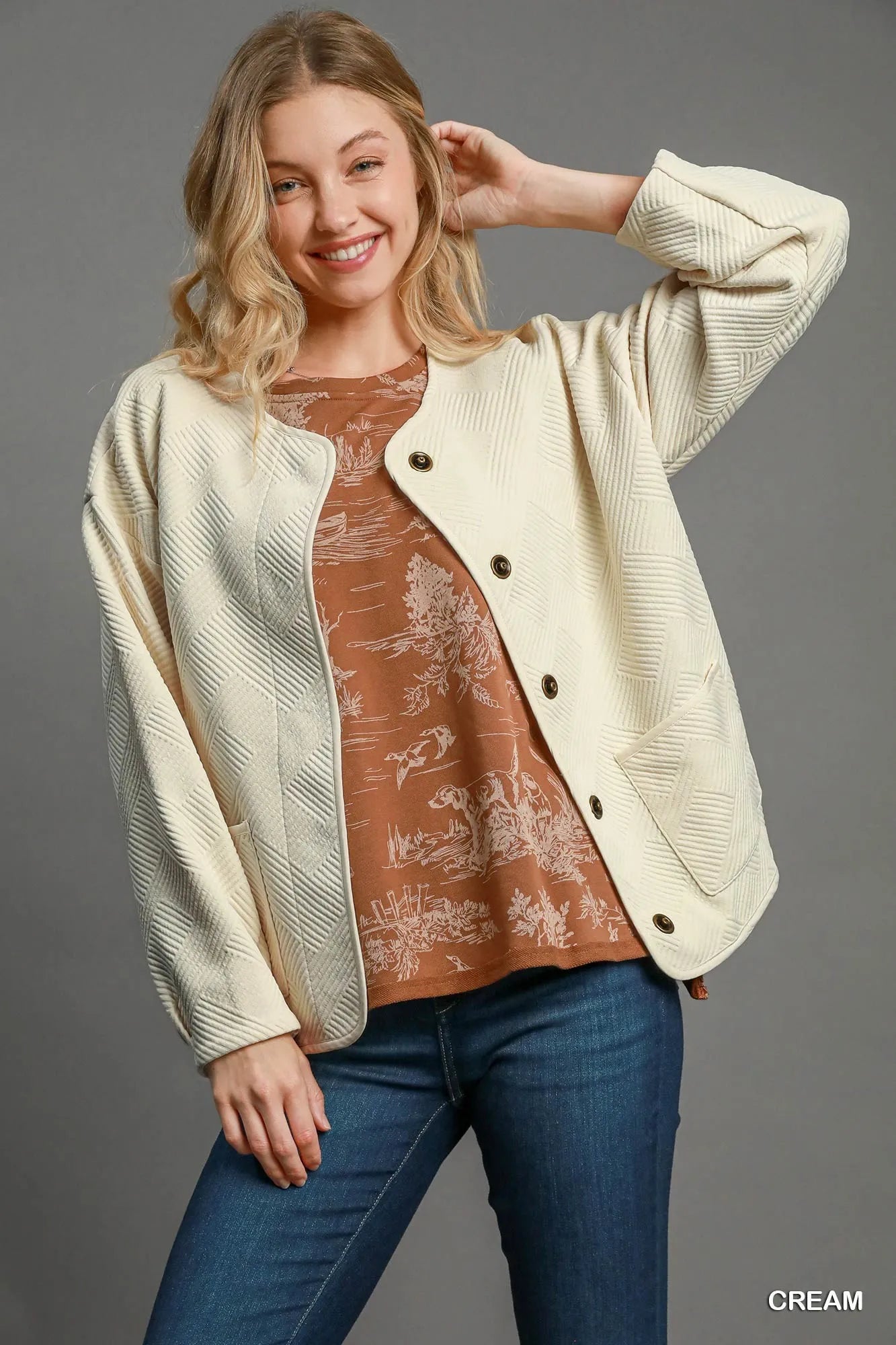 belted outerwear jacket on mannequin