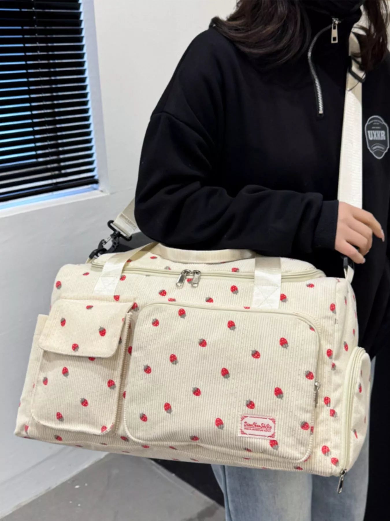 women's strawberry print corduroy travel bag - back view